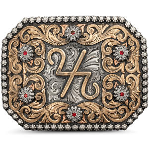 A custom belt buckle featuring a ranch brand or personalized logo built on an antiqued german silver base with golden bronze scrolls